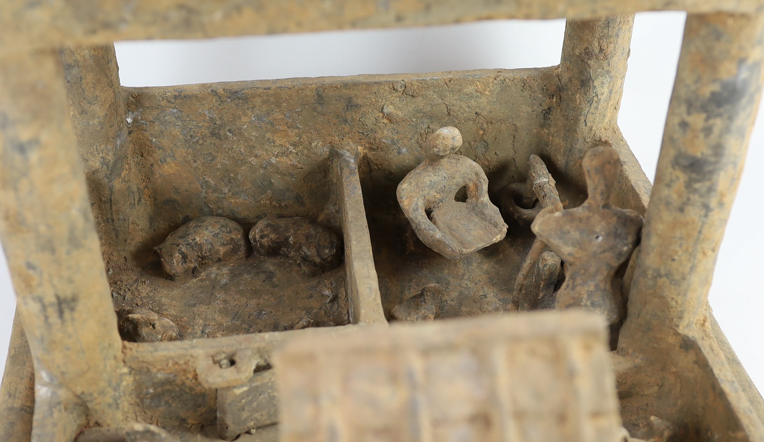 A large Chinese grey pottery model of a farmstead, Han dynasty (200BCE - 220CE), 35cm high 38cm wide 38cm deep